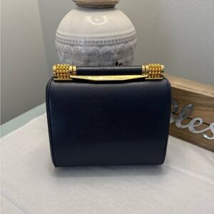 Panthers Elegant Black Handbag with Gold Accents blue
